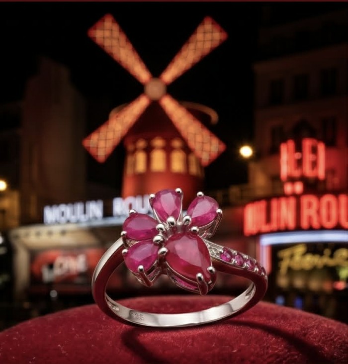 Stella - 6.9 carat Ruby .925 Sterling Silver handcrafted incredible ring s. 8 - Ruby ring close-up on red velvet, Moulin Rouge windmill in background.