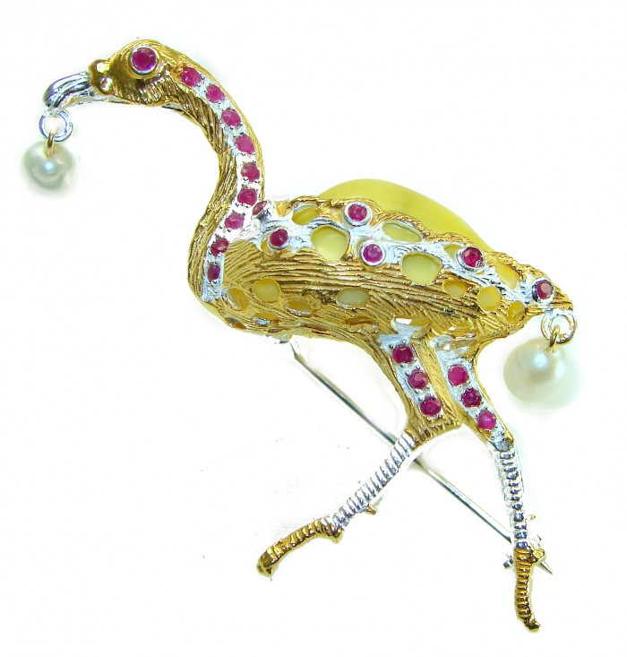 Precious Heron Natural Sea Shell 2 tones .925 Sterling Silver Brooch - Side view of heron brooch with red stones and pearl accents.