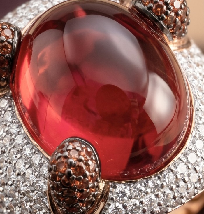 Abstract Beauty 24.6 ctw Red Topaz 6.2 carat pave Ruby .925 Sterling Silver dipped in 22K Rose Gold handcrafted Statement Ring size 7 - Close-up of red topaz and ruby Art Deco jewelry piece