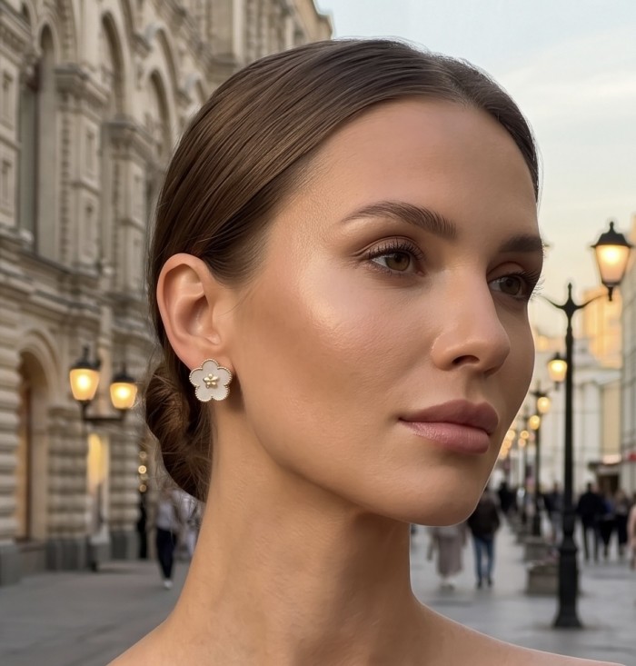 Genuine Blister Pearl .925 Sterling Silver handcrafted Statement Earrings - Woman wearing floral pearl earrings, side view in street setting.