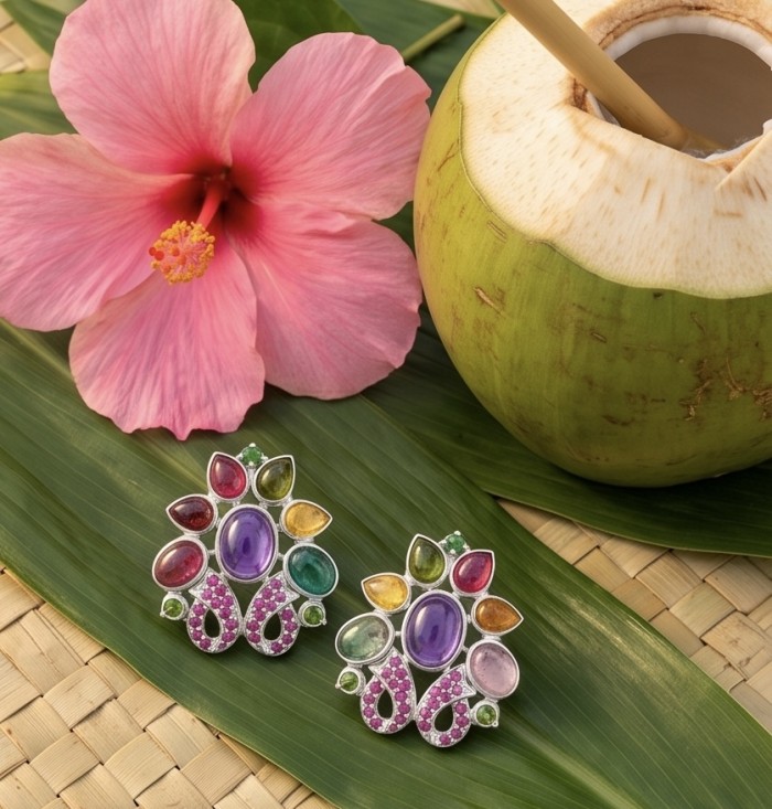 Dolce Vita Genuine 15.9 carat Brazilian Amethyst rhodium over .925 Sterling Silver handcrafted Statement handcrafted earrings - Colorful earrings with gemstones, floral backdrop, and coconut drink.