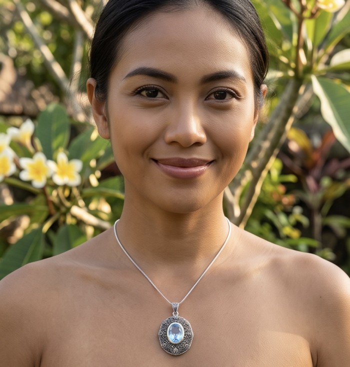 Angelina 11.9 carat authentic Aquamarine .925 Sterling Silver Handcrafted pendant - Aquamarine pendant worn outdoors, showcasing intricate silver setting.
