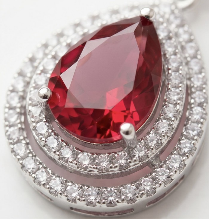 Exquisite 5.4 ctw Mozambique Ruby .925 Sterling Silver handcrafted Statement earrings - Close-up of exquisite Mozambique ruby in sterling silver pendant.