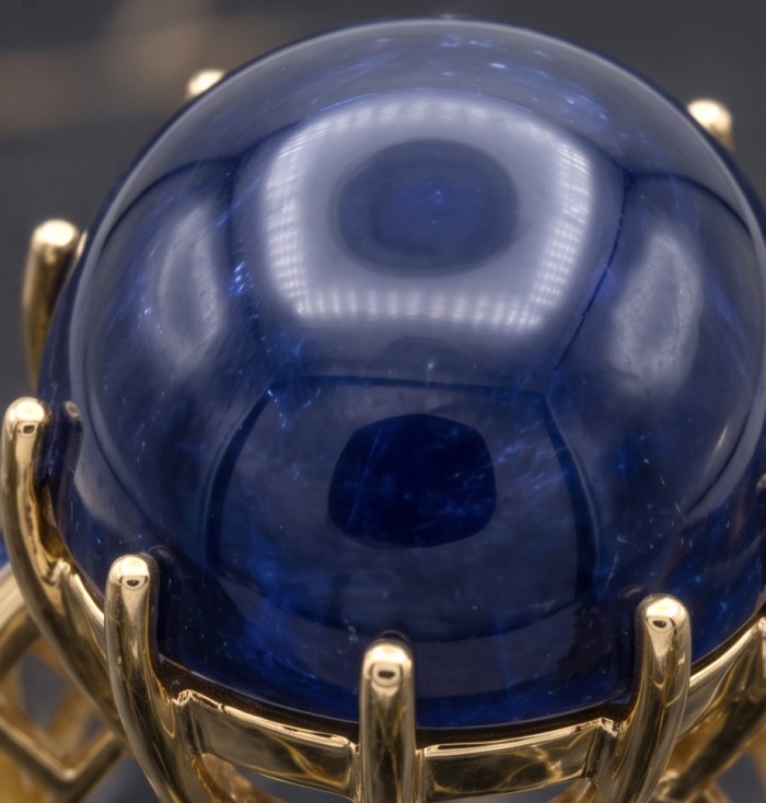 Blue Angel Genuine 34.5 carat Star Sapphire from Madagascar .925 Sterling Silver dipped in 18k Gold handcrafted Ring size 7 - Close-up of 34.5 carat blue sapphire set in gold.