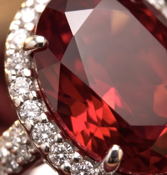 Red Empress 25.7 ctw oval cut Mozambique Ruby .925 Sterling Silver handcrafted Statement Ring size 7 1/4 - Stone close-up of Red Empress ruby with diamond accents in sterling silver