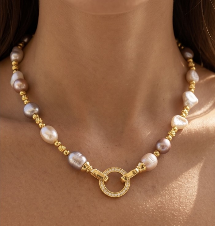 Colors of the Ocean - MOTHER OF Pearl .925 Sterling Silver diped in 14K Gold handcrafted Statement necklace - Close-up of Colors of the Ocean necklace worn on neck.