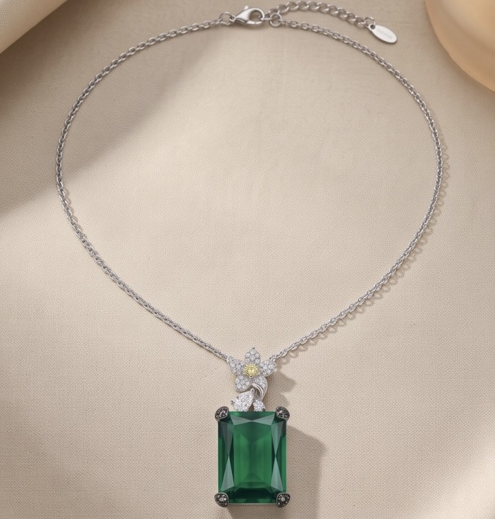 Luxurious emerald cut 14.9 carat Chrome Diopside rhodium over .925 Sterling Silver handmade Necklace - Chrome diopside necklace with diamond accents, top view.