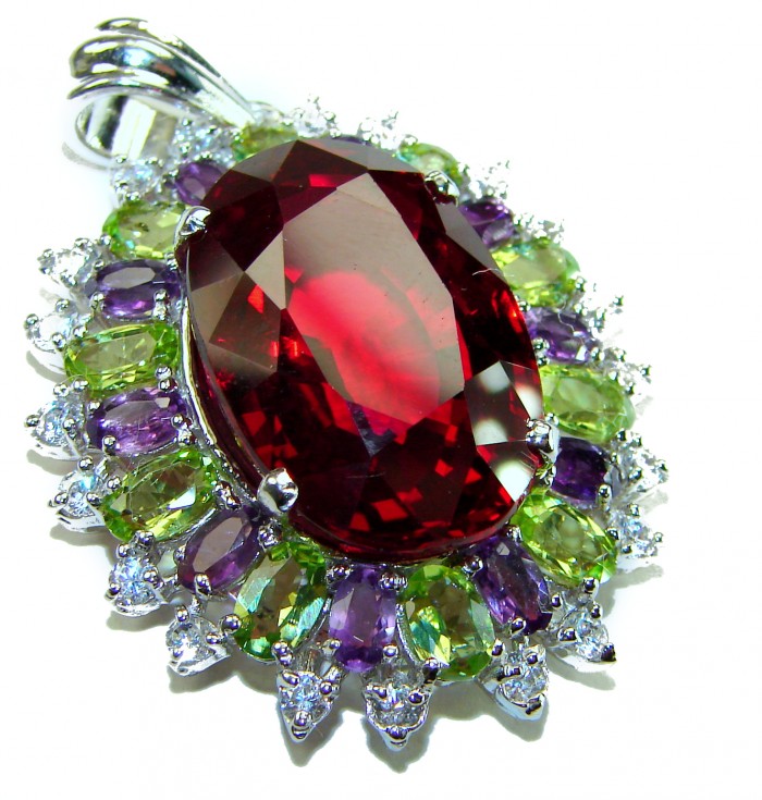 Victorian style 28.5 carat Authentic Ruby .925 Sterling Silver handcrafted Pendant - Close-up of Victorian style ruby pendant with multicolored stones.