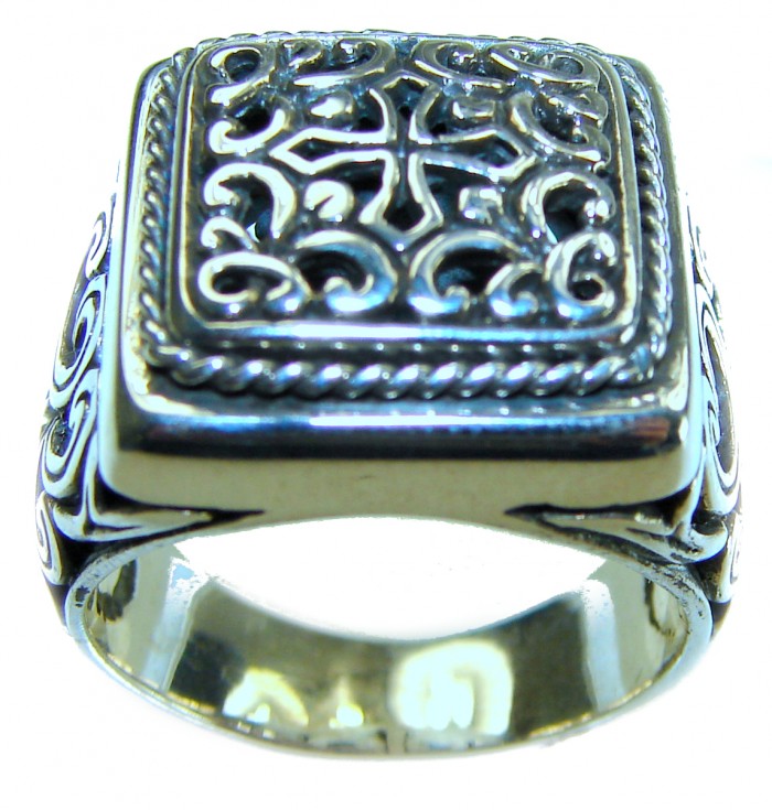 Large and Solid Bali made .925 Sterling Silver ring size 8 - Ornate sterling silver ring with cross design, side view.