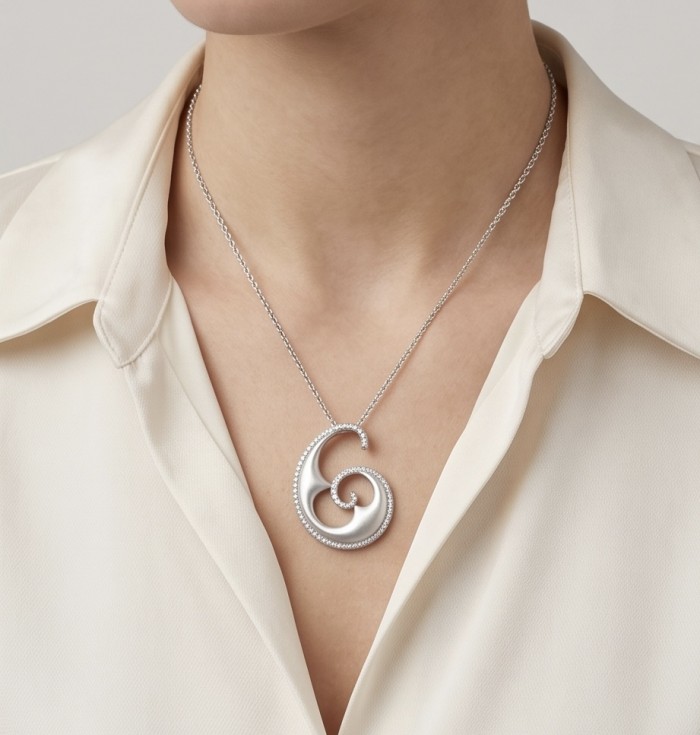 Waves 0.5 carat authentic White Topaz .925 Sterling Silver Handcrafted Pendant - Woman wearing Waves White Topaz pendant on sterling silver necklace.