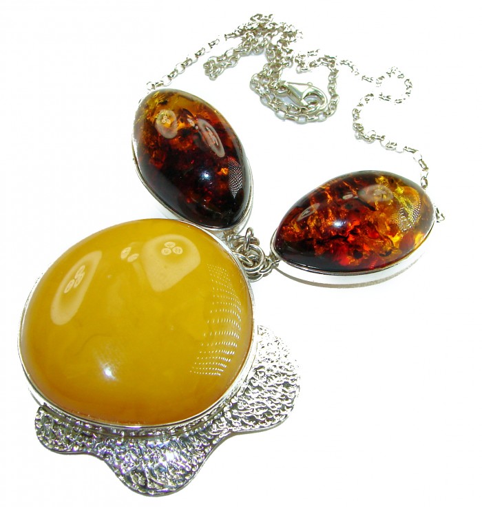 Rare Creation - natural Baltic Amber .925 Sterling Silver handcrafted necklace - Close-up of rare natural Baltic amber necklace with sterling silver.
