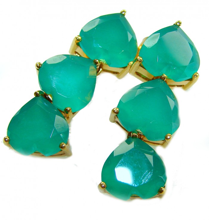 Giovanna - Authentic 21.9 carat Colombian Emerlad .925 Sterling Silver dipped in 22K Gold handcrafted earrings - Close-up of emerald gemstones in gold settings, heart-shaped design.