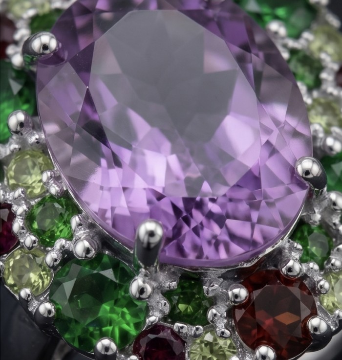 Lavender Beauty authentic 14.2 carat Amethyst .925 Sterling Silver dipped in rhodium handcrafted Ring size 8 1/4 - Close-up of Lavender Beauty amethyst with multicolored gemstones.