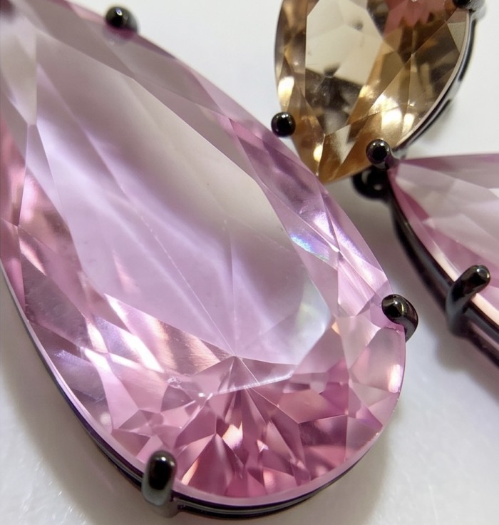 Victoria- authentic pear cut 12.7 carat Pink Topaz .925 Sterling Silver dipped in black rhodium handcrafted Earrings - Close-up of pear cut pink topaz set in .925 sterling silver.
