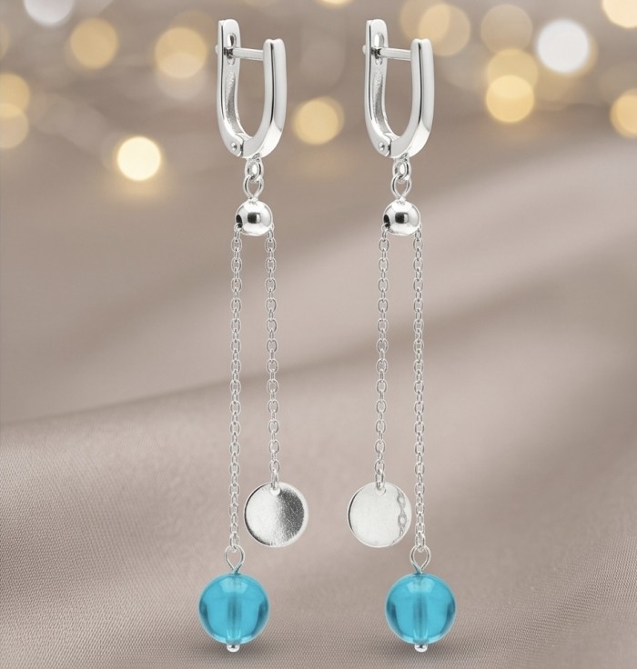 Dream 3.8 carat Apatite .925 Sterling Silver Handcrafted Statement earrings - Hanging silver earrings with turquoise beads and circular accents, front view.