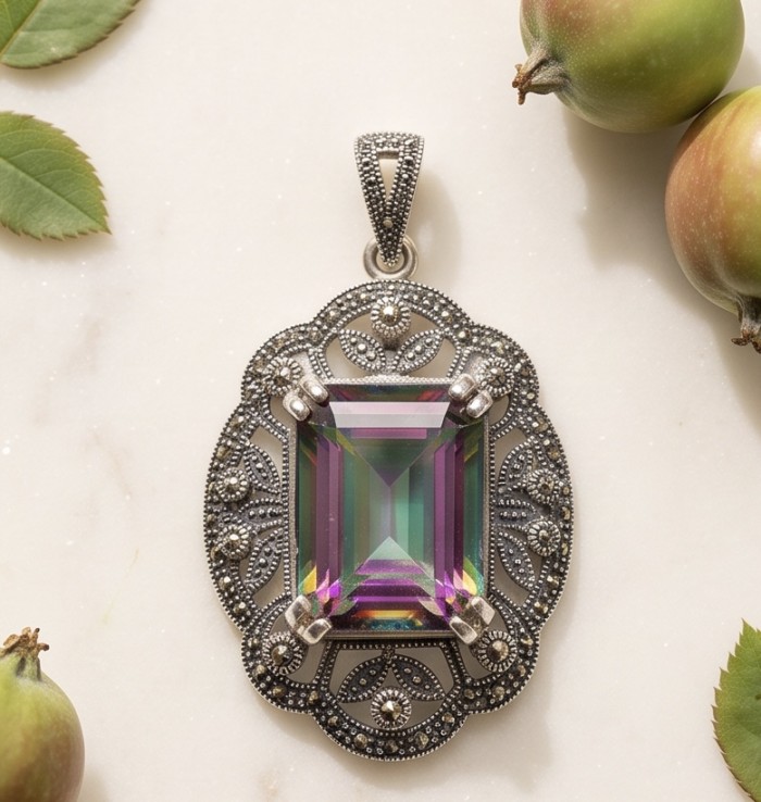 Iconic Design 22.5 baquette cut Mystic Topaz Marcasite .925 Sterling Silver dipped in black rhodium handcrafted Pendant - Pendant with mystic topaz and marcasite, top view on marble surface.