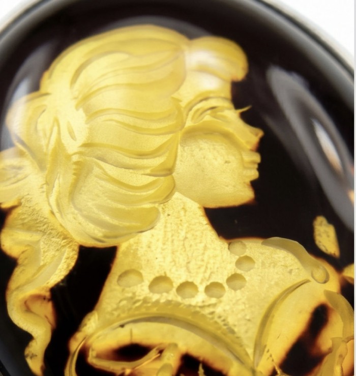 Beautiful Authentic Cameo carved Baltic Amber .925 Sterling Silver handcrafted ring; s. 7 adjustable - Close-up of cameo carved Baltic amber in sterling silver setting.