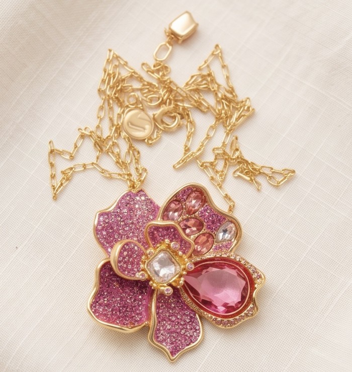 Wonderland 68.5 carat multicolor Pink Topaz 14K Gold over .925 Silver handcrafted Statement necklace brooch - Flower-shaped pink topaz pendant with gold chain, top view.