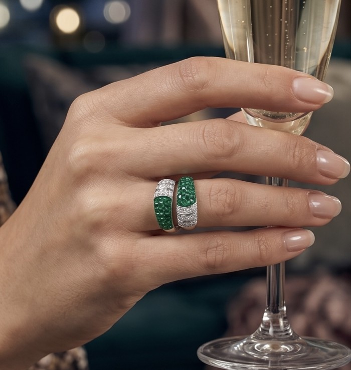 Precious Emerald bow- mystery setting authentic 16.2 carat Emerald .925 Sterling Silver Eternity Ring size 8 - Emerald bow ring on hand, holding a champagne glass.