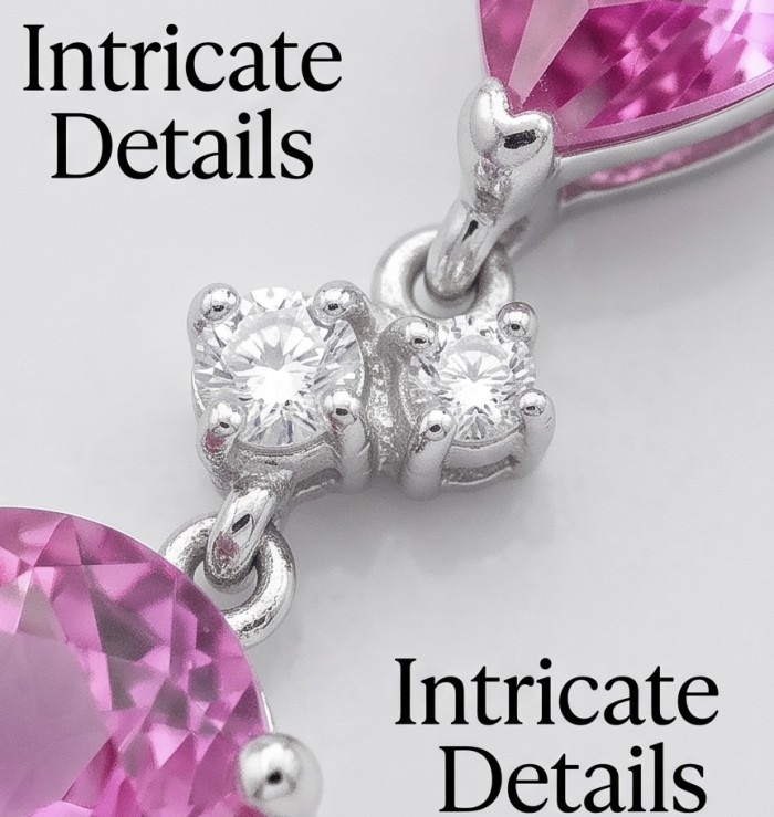 Incredible oval cut 18.8 carat Bubblegum Pink Sapphire .925 Sterling Silver handcrafted pendant - Close-up of intricate details on pink sapphire jewelry piece