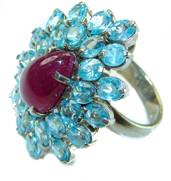 Incredible 29.5 carat Swiss Blue Topaz Ruby .925 Sterling Silver Oversized Ring size 7 3/4 - Close-up of Swiss Blue Topaz and Ruby Sterling Silver ring.