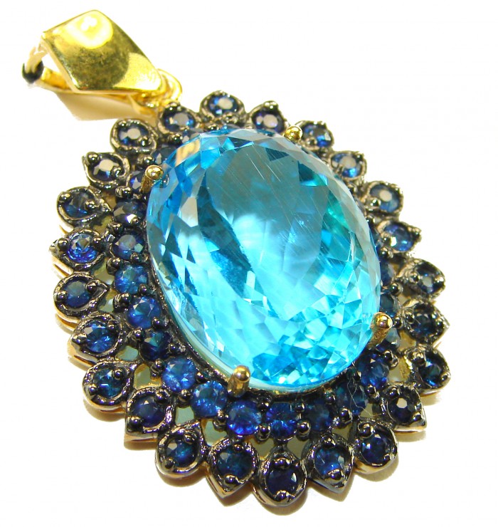 Vintage style oval cut 26.8 carat Swiss Blue Topaz .925 Sterling Silver DIPPED IN 22K Gold handmade Pendant - Close-up of vintage style oval cut Swiss Blue Topaz pendant.