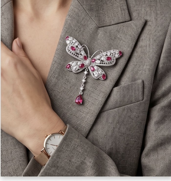 Vintage Design - Red Butterfly - Genuine 10.2 carat Ruby 14k rhodium over .925 Sterling Silver handmade Pendant Brooch - Vintage red butterfly brooch worn on jacket, showcasing rubies.