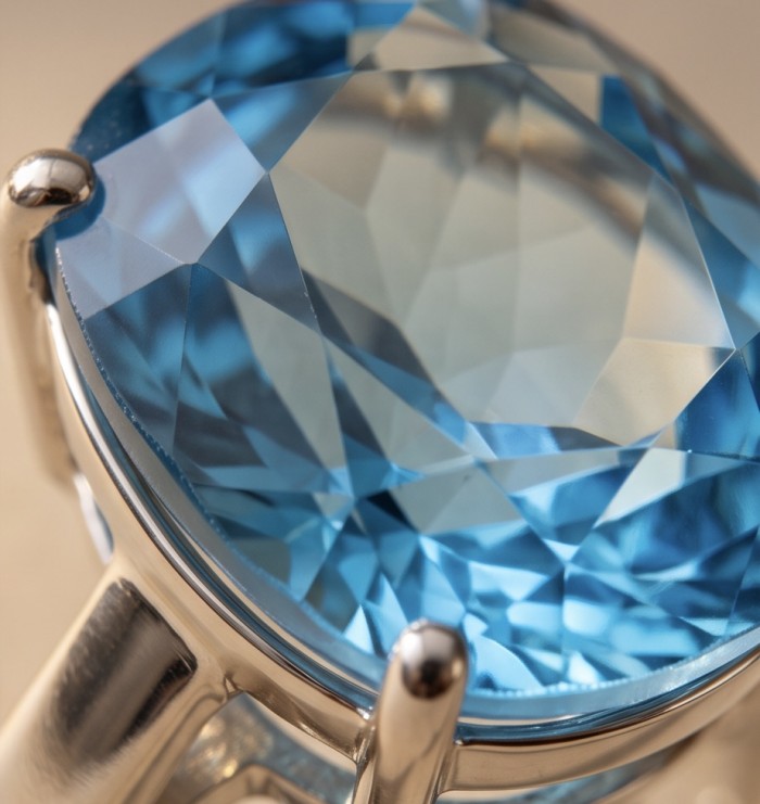 Aqua 18.5 carat Swiss Blue Topaz rhodium over .925 Sterling Silver handcrafted ring size 5 3/4 - Close-up of Swiss Blue Topaz stone set in sterling silver ring.