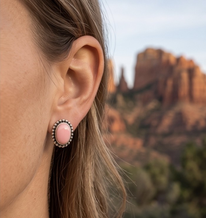 4.2 carat Pink Opal .925 Sterling Silver incredible handcrafted Earrings - Close-up of pink opal earring worn, showcasing sterling silver setting.