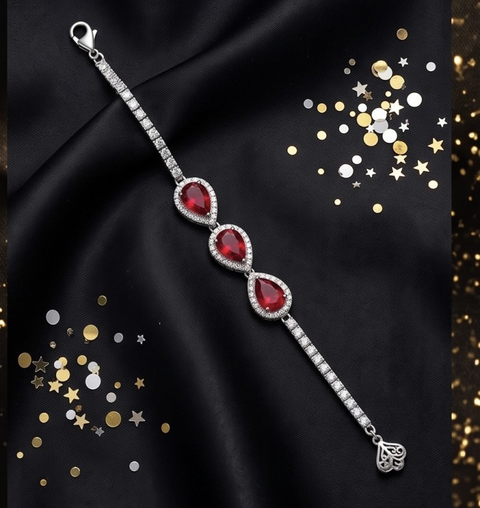 Giuseppina - Magnificent 15.7 carat authentic Ruby rhodium over .925 Sterling Silver handcrafted Statement Bracelet - Elegant rhodium bracelet with ruby stones on black fabric background.