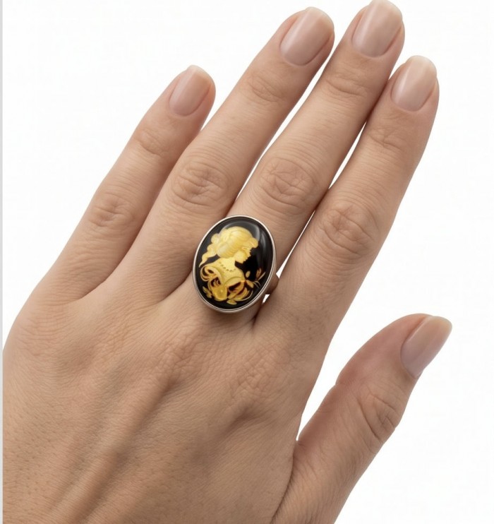 Beautiful Authentic Cameo carved Baltic Amber .925 Sterling Silver handcrafted ring; s. 7 adjustable - Cameo ring worn on hand, featuring carved Baltic amber in sterling silver.