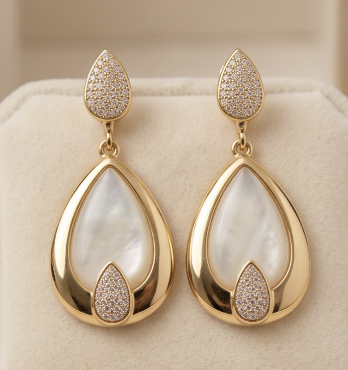 Top quality Sublime Blister Pearl 22K Gold over .925 Sterling Silver handcrafted Earrings - Elegant earrings with pearl and gold accents, front view.