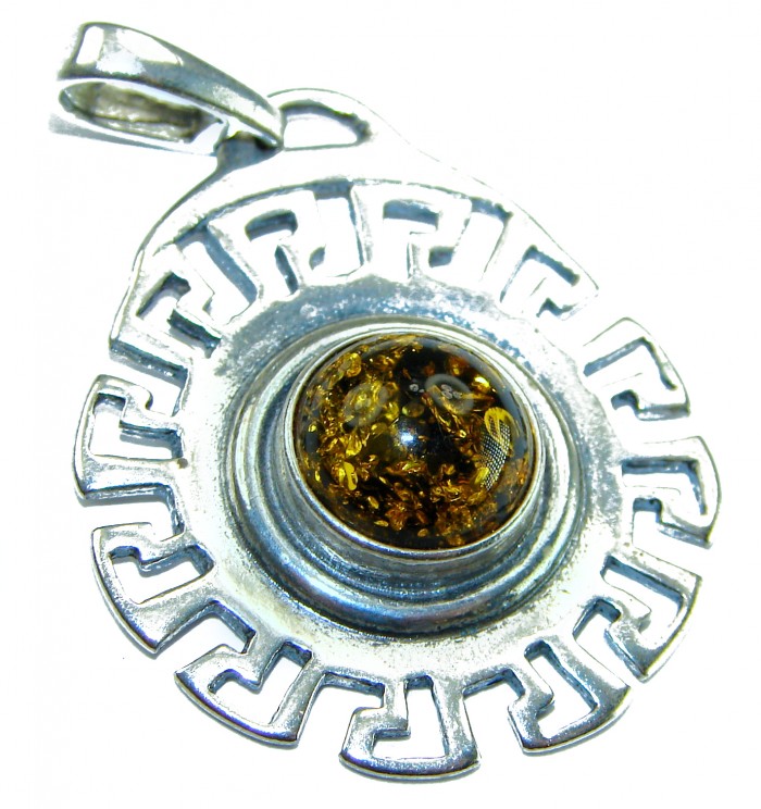 Prehistoric Authentic Baltic Amber .925 Sterling Silver beautifully handcrafted Pendant - Silver pendant with amber stone, top view displaying intricate design