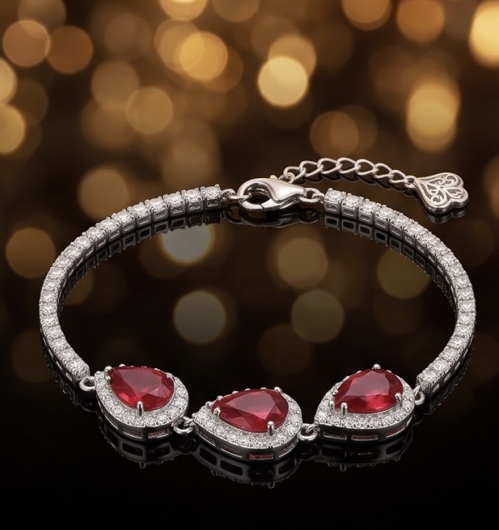 Giuseppina - Magnificent 15.7 carat authentic Ruby rhodium over .925 Sterling Silver handcrafted Statement Bracelet - Bracelet with rubies and diamonds, clasp detail, on blurred background.