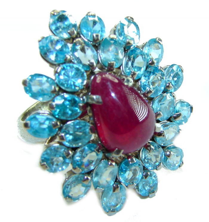Incredible 29.5 carat Swiss Blue Topaz Ruby .925 Sterling Silver Oversized Ring size 7 3/4 - Close-up of a ring with blue topaz and ruby stones in sterling silver.