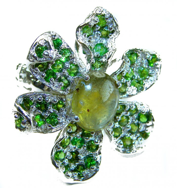 Exotica Natural 15.4 carat Green Tourmaline Tsavorite Garnet .925 Sterling Silver handmade Large Statement Ring size 7 - Close-up of flower-shaped jewelry with green tourmaline and garnet stones