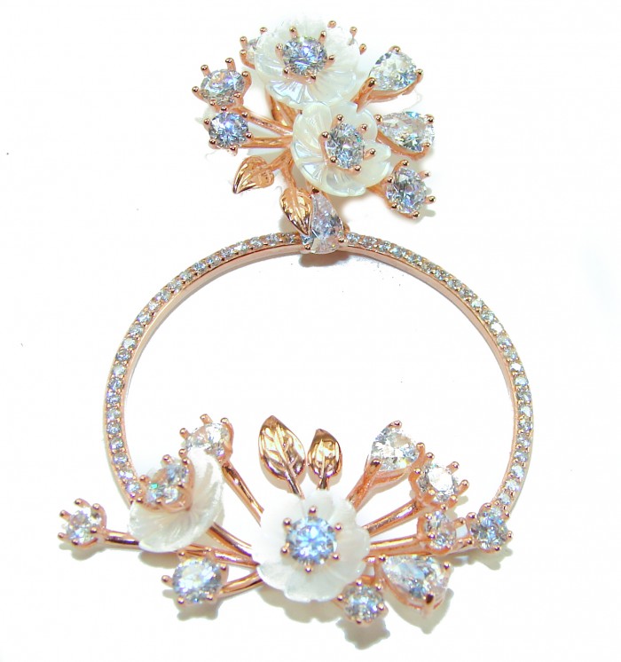 White Garden 15.5 carat White Topaz .925 Sterling Silver dipped in Rose Gold handcrafted pendant - Floral design front view of White Garden 15.5 carat Topaz jewelry piece.