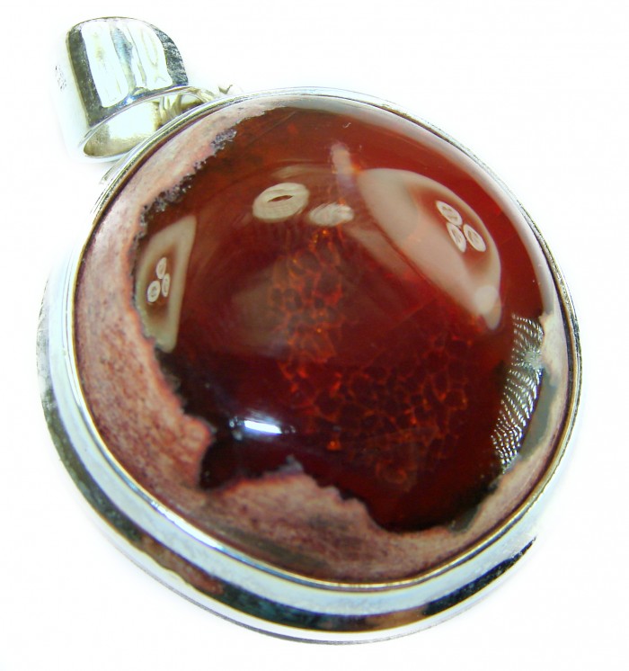 Inner Fire Natural 29.2 carat Mexican Fire Opal .925 Sterling Silver handmade Pendant - Close-up of Inner Fire Mexican Fire Opal pendant with silver setting.