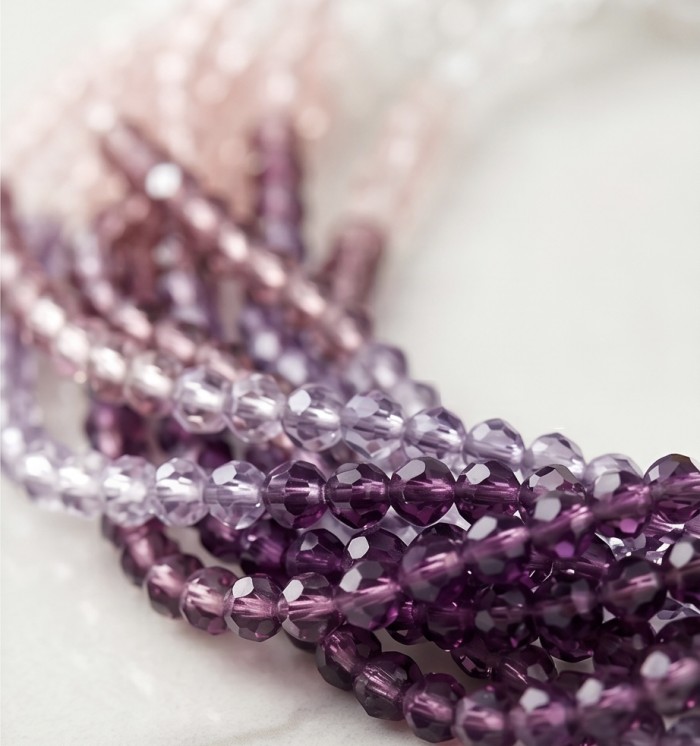 Purple CASCADE Authentic Mountain Crystal .925 Sterling Silver handmade Necklace - Close-up of purple crystal beads from CASCADE jewelry.