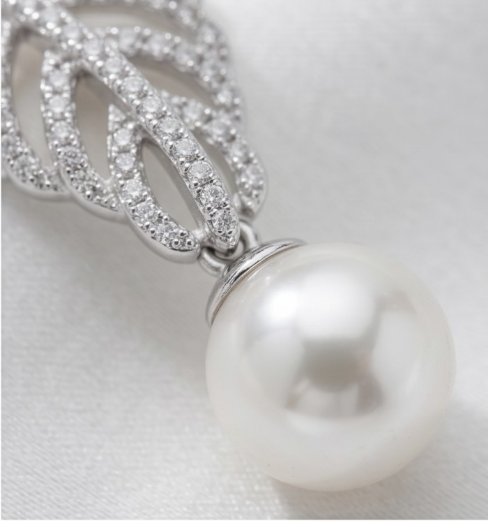 BLOOMING BEAUTY Genuine Pearl 0.2 CARAT lab grown Diamond rhodium over .925 Sterling Silver handcrafted Statement Earrings - Pendant close-up of pearl and diamond detail on Blooming Beauty jewelry.