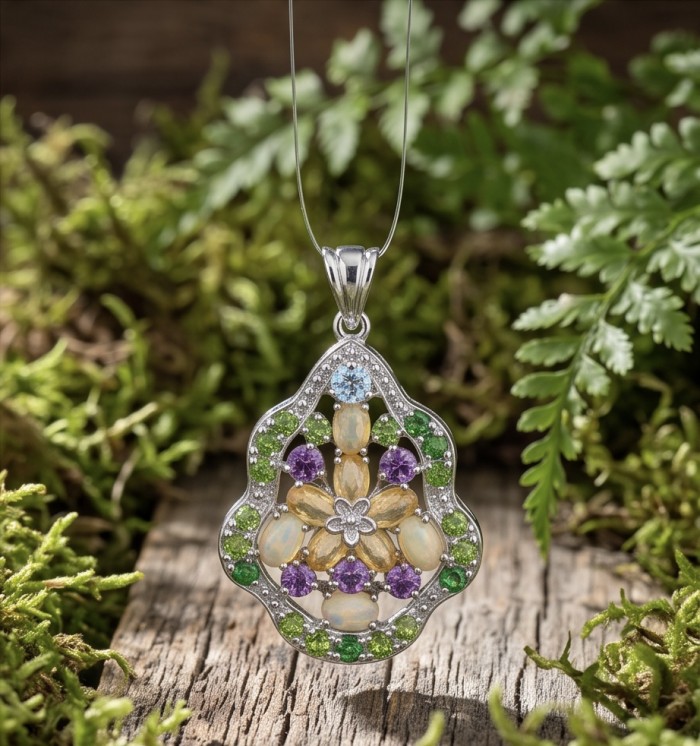 Giovanna - Authentic 18.9 carat Brazilian Citrine .925 Sterling Silver dipped in rhodium handcrafted Statement pendant - Pendant detail with colorful gemstones on wood and foliage background