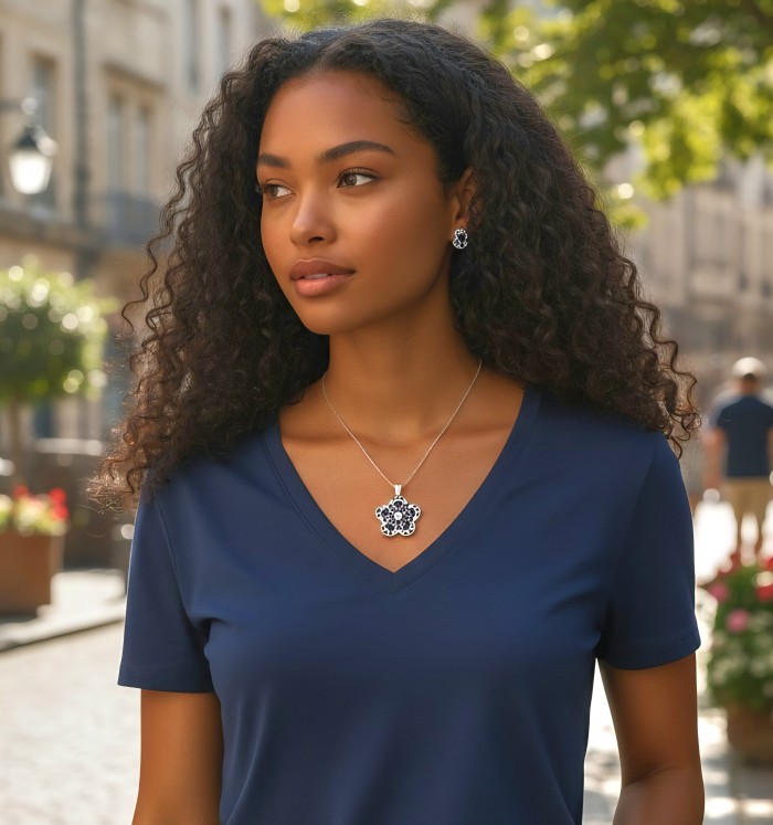 Julietta 12.5 carat genuine Sapphire .925 Sterling Silver dipped in rhodium handmade Pendant - Woman wearing Julietta Sapphire necklace and earrings, front view.