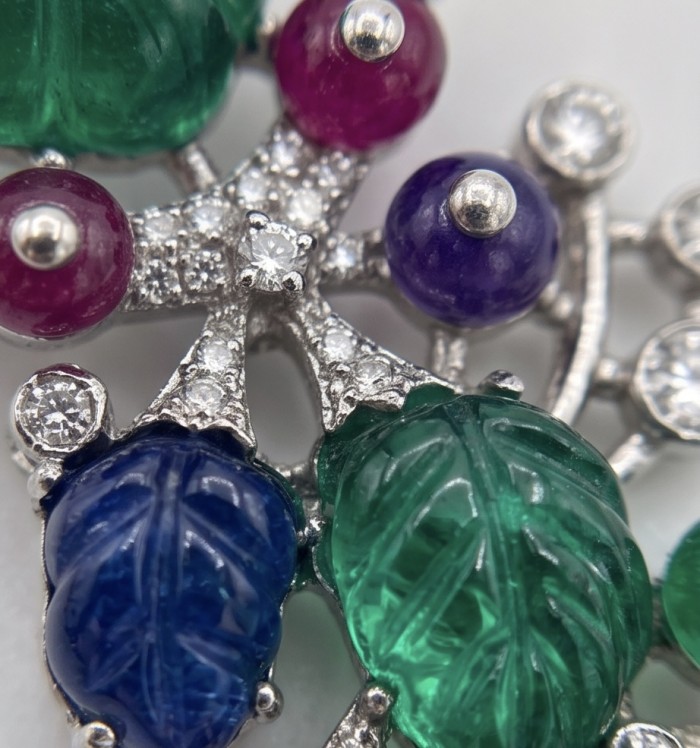 RARE BEAUTY! Valentina 28.2 carat CARVED Ruby Emerald Sapphire .925 Sterling Silver dipped in rhodium Statement handcrafted earrings - Close-up detail of carved gemstones with silver and diamond accents.