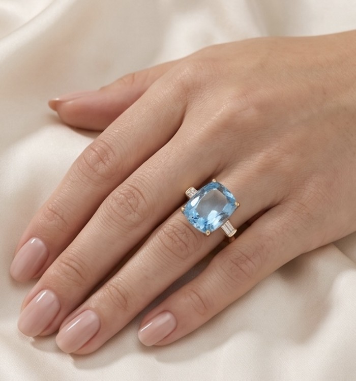 Angelina 9.4 carat authentic Swiss Blue Topaz .925 Sterling Silver dipped in 18k Gold Handcrafted Ring size 6 - Swiss Blue Topaz ring worn on hand, highlighting the gemstone.