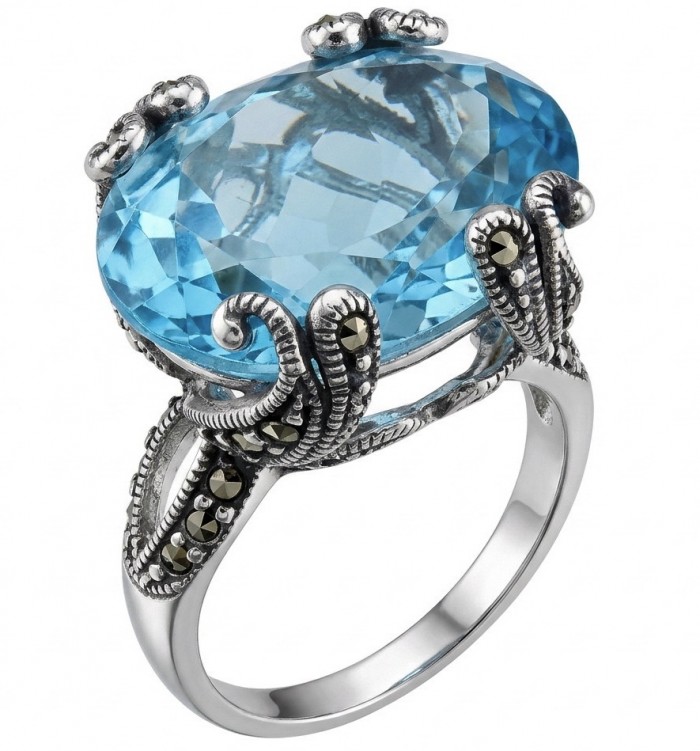 Mesmerizing 22.8 carat Aquamarine rhodium over .925 Sterling Silver handcrafted Large ring size 8 - Side view of a 22.8 carat aquamarine ring in rhodium over .925 sterling.