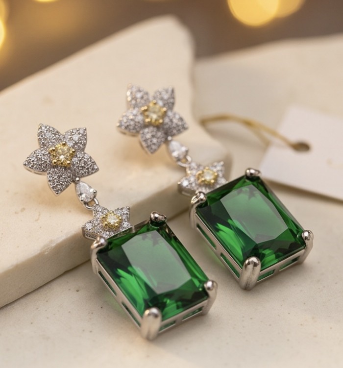 Tiffany - Authentic 14.8 CARAT Siberian Chrome Diopside rhodium over .925 Sterling Silver handcrafted earrings - Close-up of green diopside earrings with floral diamond accents.