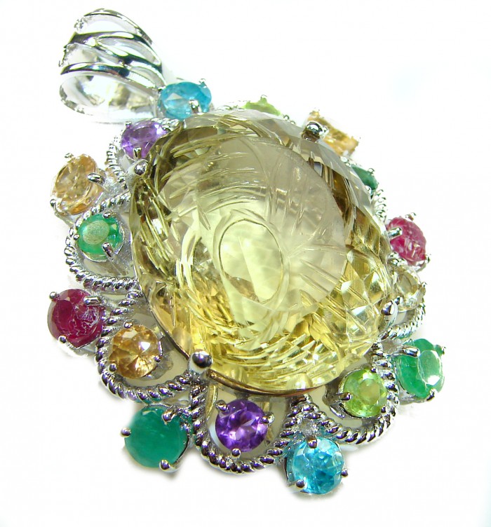 Luxury genuine 30.5 CARAT Champagne Topaz Peridot .925 Sterling Silver handmade Pendant - Close-up of colorful gemstone pendant with champagne topaz centerpiece.