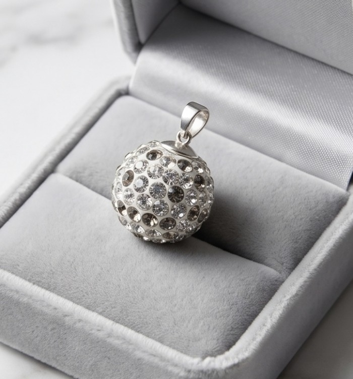 Harmony Sphere with bell inside pave Topaz .925 Sterling Silver handmade pendant - Harmony Sphere pendant, top view, pave topaz, in jewelry box.