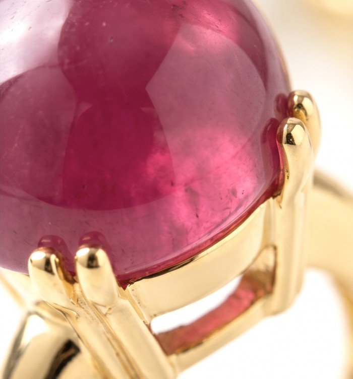 Scarlett 12.7 ctw Mozambique Ruby .925 Sterling Silver dipped in 22K Gold handcrafted Statement Ring size 4 1/2 - Close-up of Scarlett Mozambique Ruby in gold setting, side detail.