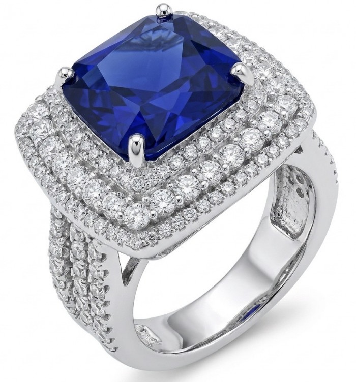The Star of Kashmir princess cut 15.6 carat Sapphire .925 Sterling Silver handmade Statement ring size 8 - Close-up of a sapphire ring with diamond accents in white gold setting